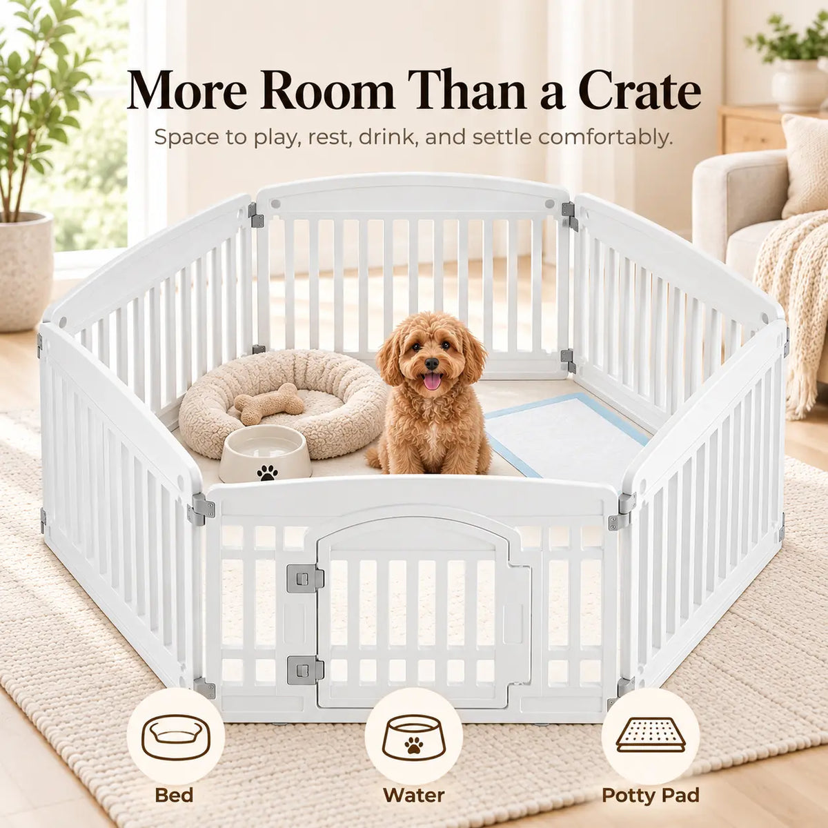 White plastic pet playpen with a gate and panel design, shown in a bright living room with a small brown dog inside. The image includes text reading 'More Room Than a Crate' and icons at the bottom indicating bed, water, and potty pad compatibility.