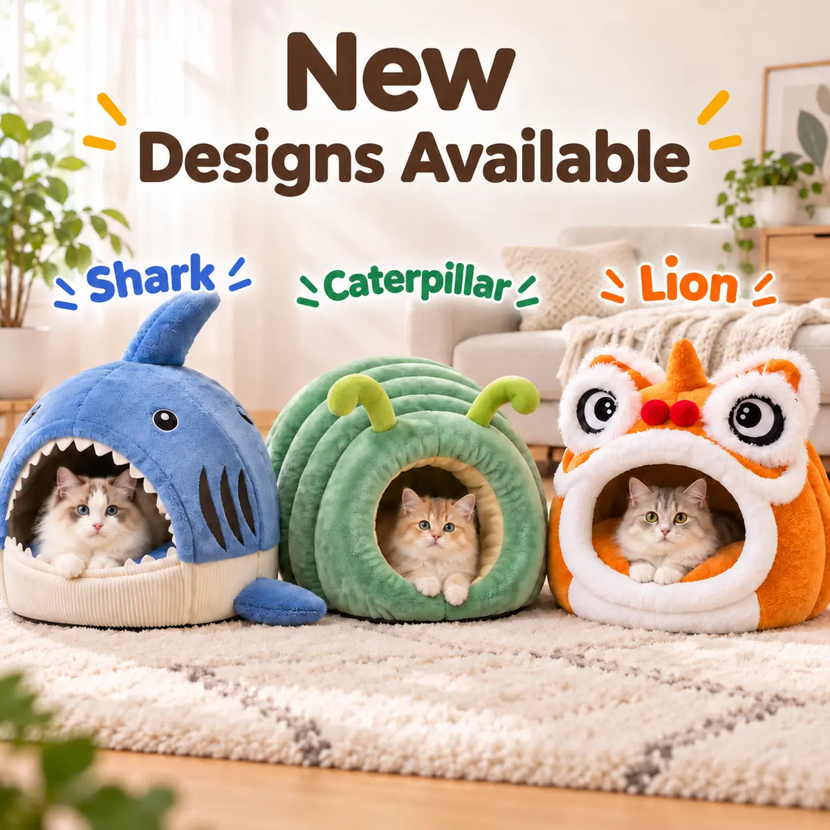 Three plush cat beds in shark, caterpillar, and lion designs are shown on a rug in a living room, with cats inside each bed. Large text at the top reads 'New Designs Available' with labels 'Shark', 'Caterpillar', and 'Lion'.